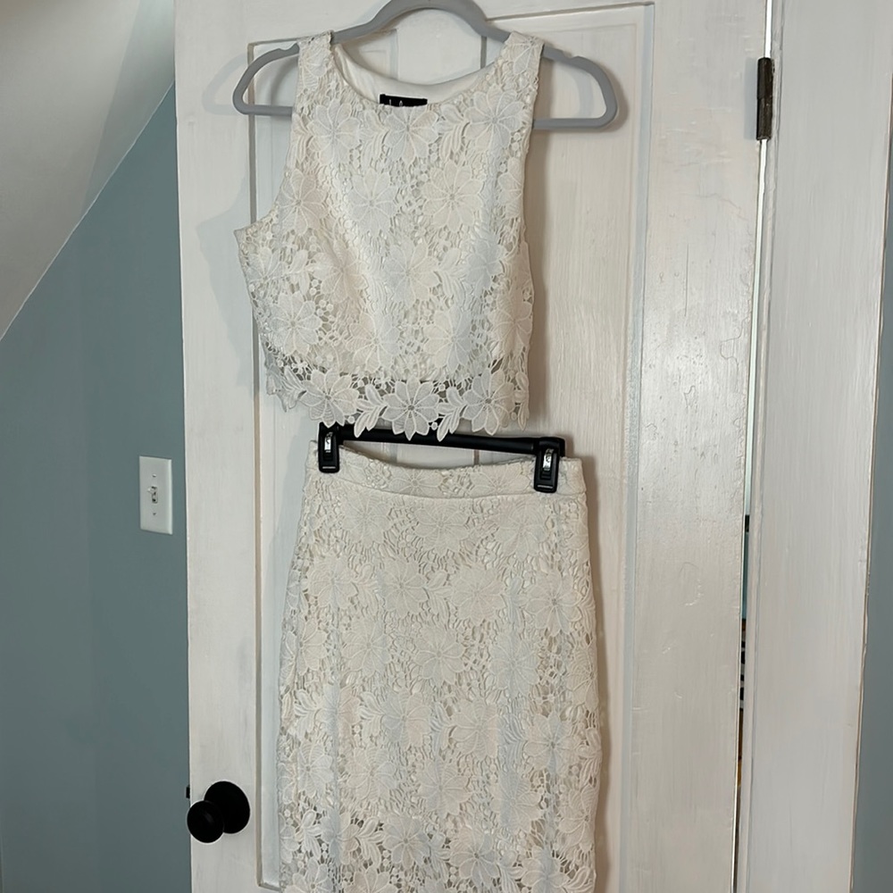 Two piece cropped top and skirt. Only worn once for rehearsal dinner